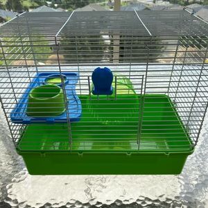 green hamster cage